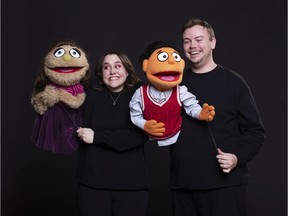 Layne Labbe with the puppet Kate Monster and Jason Bakaas with Princeton in Front Row Players' Avenue Q.