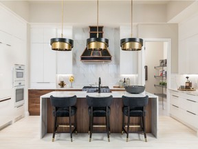 The kitchen in the Clearwater by Baywest Homes in Cranston's Riverstone.