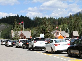 Visitors stream into Banff National Park on Friday, August 2, 2019. The August long weekend is an extremely busy time with thousands visiting the park west of Calgary.