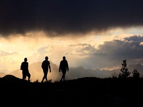 Hikers descending Turtle Mountain in the Crowsnest Pass. Courtesy, Andrew Penner