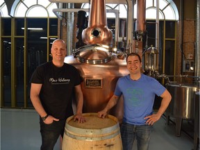 Jacques Tremblay and Daniel Plenzik, blue shirt, owners of Bridgeland Distillery. Supplied photo
