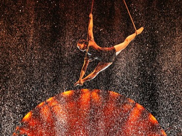 Performers rehearse a scene using a waterfall in Cirque Du Soleil's Luzia.