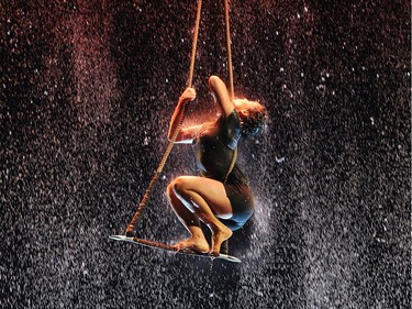 Performers rehearse a scene using a waterfall in Cirque Du Soleil's Luzia at Stampede Park in Calgary.