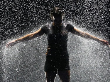 Performers rehearse a scene using a waterfall in Cirque Du Soleil's Luzia at Stampede Park in Calgary.