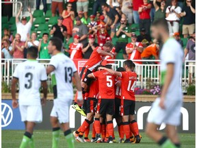 Cavalry FC celebrate teammate Julian Buscher's first half goal during CPL soccer action between Cavalry FC and York9 Football Club at ATCO Field at Spruce Meadows in Calgary on Wednesday, August 21, 2019. Jim Wells/Postmedia