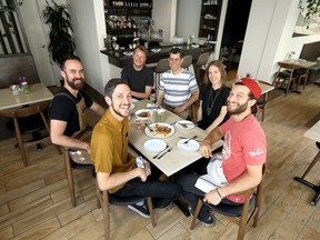 L-R, Jared Blustein, Alex Hamilton, Scott Cuming, Sirous Savadlou, Laura Blustein and Richard Alame, six of the 12 owners of The Allium for Off The Menu in Calgary on Thursday, August 29, 2019. Darren Makowichuk/Postmedia