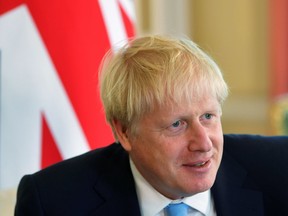 Britain's Prime Minister Boris Johnson meets with King Abdullah II of Jordan at 10 Downing Street in London on August 7, 2019, ahead of bilateral talks and a working lunch.