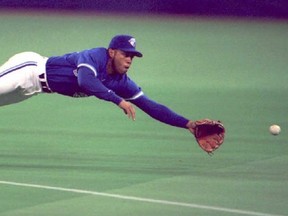 Blue Jays legend Roberto Alomar makes one of his superhuman defensive plays. GETTY IMAGES FILE