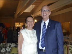 Cal 0824 MRU McCaig 1 Pictured are Ann McCaig and Mount Royal University's new president and its first vice-chancellor Tim Rahilly at a reception held at her home to welcome Rahilly and introduce him to influential members of the community.