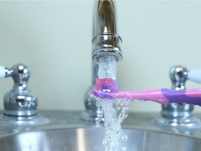 Calgary City council is again considering fluoride in Calgary's tap water after studies show more cavities in Calgary children. Gavin Young/Postmedia