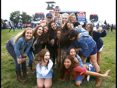 Music fans brave the cold on the first day of the Country Thunder music festival, held at Prairie Winds Park in Calgary Friday, August 16, 2019. Dean Pilling/Postmedia