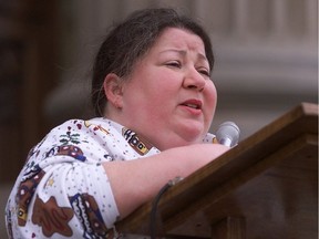 In 2001, a group of 30 people led by Carmela Hutchison, pictured here in front of the legislature building, bused from Calgary to Edmonton to protest conditions for the poor and disabled.