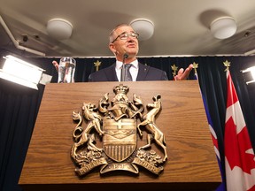 Alberta Finance Minister Travis Toews speak about the government's finances at the Alberta Legislature on Tuesday, Aug. 27, 2019, in Edmonton.