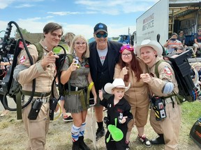 Sean Nicholson, Candace Schneider, Dan Aykroyd, Jessica Smith, Eldon Smith and Myrick Smith. Members of the Calgary Ghostbusters met Dan Aykroyd at the set of Ghostbusters 2020 in Crossfield last week.  Supplied image: Candace Schneider