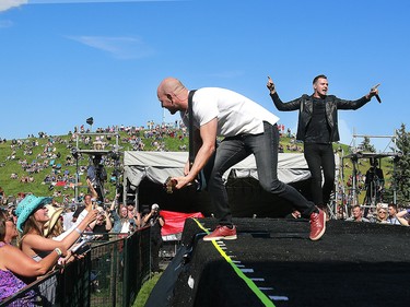 Lead vocalist Ty Hunter and guitarist Brock Hunter of the Hunter Brothers perform on the second day of the Country Thunder music festival, held at Prairie Winds Park in Calgary Saturday, August 17, 2019. Dean Pilling/Postmedia