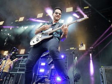 Guitarist for Jordan Davis performs on the second day of the Country Thunder music festival, held at Prairie Winds Park in Calgary Saturday, August 17, 2019. Dean Pilling/Postmedia