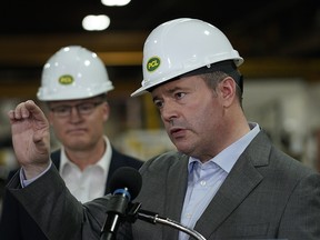 Alberta Premier Jason Kenney, right, and Alberta associate minister of Red Tape Reduction Grant Hunter at the PCL Fabrication Facility in Nisku on Wednesday May 29, 2019.