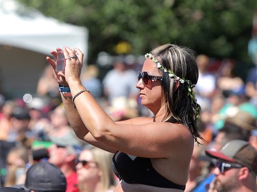 Music fans enjoy the sunshine as country duo Leaving Thomas performs on the third day of the Country Thunder music festival, held at Prairie Winds Park in Calgary Saturday, August 17, 2019. Dean Pilling/Postmedia