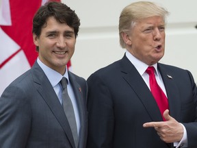 President Donald Trump (R) welcomes Canadian Prime Minister Justin Trudeau at the White House in Washington, D.C. in 2017.
