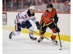 Dmitry Zavgorodniy and Ryan McLeod fight for the possession of the puck during the battle of Alberta prospects game at Scotiabank Saddledome in Calgary on Tuesday, September 10, 2019. Azin Ghaffari/Postmedia Calgary