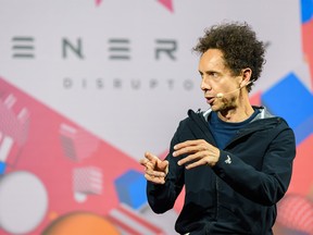 Journalist and best-selling author Malcolm Gladwell speaks at the Energy Disruptors conference on Wednesday.