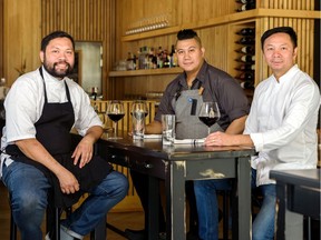 Chef Jay Magnaye, left, Sous chef Jose Battad, and Chef Duncan Ly pose for as photo at Melo Eatery in Calgary on Thursday, September 19, 2019. Azin Ghaffari/Postmedia Calgary