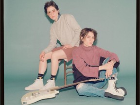 Sara Quin (on chair) and Tegan Quin of Tegan and Sara.