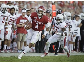 NORMAN, OK - SEPTEMBER 07: Quarterback Jalen Hurts #1 of the Oklahoma Sooners runs outside against the South Dakota Coyotes at Gaylord Family Oklahoma Memorial Stadium on September 7, 2019 in Norman, Oklahoma.