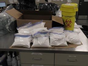 Some of the nearly $1 million worth of illegal drugs and production paraphernalia seized by Calgary police. Supplied photo