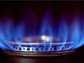 A gas stove burner is alight in this file photo.
