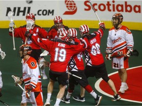 Calgary Roughnecks celebrate a goal on Buffalo Bandits goalie, Matt Vinc in Game 2 of the 2019 NLL Finals at the Scotiabank Saddledome Calgary on Saturday, May 25, 2019. Darren Makowichuk/Postmedia