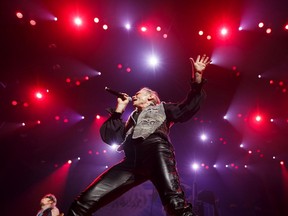 Bruce Dickinson of Iron Maiden performs with the band during its Legacy of the Beast tour stop at Rogers Place in Edmonton, on Aug. 30, 2019.  Ian Kucerak/Postmedia