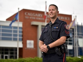 Constable Jeremy Shaw poses for a photo outside the Calgary Police Headquarters in Calgary on Friday, Sept. 6, 2019. Constable Shaw is an advocate for raising awareness about the first responders suicide prevention.