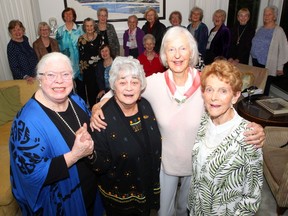 Clarice Siebens, left, Carol Shipley, Wendy Rebanks and Shirley Roddick pose for a photo during a reunion of 21 women, who first came to know one another 66 years ago, when they were all sponsored to attend Elizabeth II's Coronation as Queen of the Commonwealth.