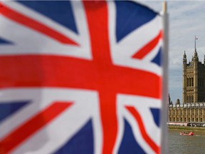 The Palace of Westminster housing the Houses of Parliament is seen from Westminster Bridge with a Union Flag in the foreground in central London on August 28, 2019 - British Prime Minister Boris Johnson announced Wednesday that the suspension of parliament would be extended until October 14 -- just two weeks before the UK is set to leave the EU -- enraging anti-Brexit MPs. (Photo by DANIEL LEAL-OLIVAS / AFP)DANIEL LEAL-OLIVAS/AFP/Getty Images