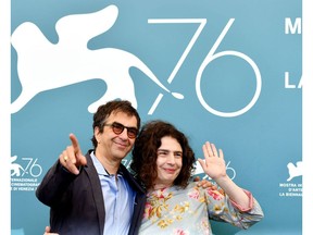 Canadian director Atom Egoyan (L) and Lebanese actress Arsinee Khanjian pose during the photocall for the film Guest of Honour in Venice.