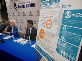 Members of the Los Angeles County Department of Public Health speak during a press conference to announce an investigation into deaths associated with the use of e-cigarettes, also known as vaping, in Los Angeles, California on September 6, 2019. - With several cases of death resulting from a severe pulmonary disease linked to vaping across the nation, Public Health is urging the public to take precautions with vaping.