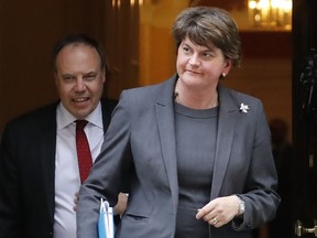 Northern Ireland's Democratic Unionist Party (DUP) leader Arlene Foster (R) and deputy Nigel Dodds l