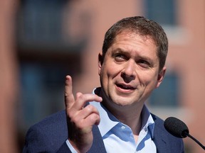 Conservative Party of Canada leader Andrew Scheer speaks to the media during a campaign stop in Sainte-Hyacinthe, Quebec, Canada September 19, 2019.