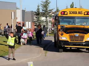 Students drive at Chaparral School on the first day of classes, Tuesday September 3, 2019.