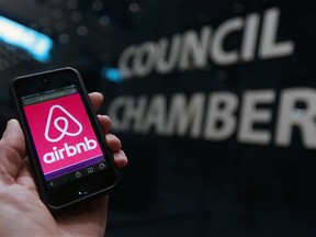 The Airbnb logo is shown outside Calgary city council. Gavin Young/Postmedia