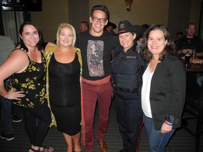 Pictured from left at the Unity in Uniform event at the Bank and Baron are co-organizer Katie Collins-Tucker; Consulate General of the United States of America public affairs assistant Casey Bohn; event co-founder and organizer Gregory John; Const. Dyana McElroy and U.S. Consul Lucia Piazza.