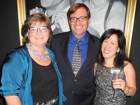 Pictured at Raise a Little Hull, a fabulous fundraiser in support of Hull Services, are Hull Services executive director Julie Kerr with her husband, Alberta Innovates' Michael Kerr, and Hull's Emily Wong.
