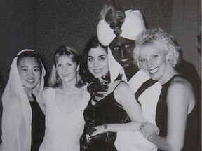 Canada's Prime Minister Justin Trudeau, with his face and hands painted brown, poses with others during an "Arabian Nights" party when he was a 29-year-old teacher at the West Point Grey Academy in Vancouver, Canada, in this photo published in the academy's 2000-2001 yearbook. This image, published in The View yearbook, was obtained by Time. NO RESALES. NO ARCHIVES     TPX IMAGES OF THE DAY ORG XMIT: TOR501