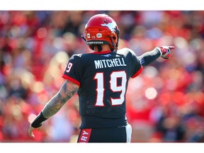 Calgary Stampeders quarterback Bo Levi Mitchell directs traffic against the Edmonton Eskimos during CFL football in Calgary on Monday. Photo by Al Charest/Postmedia.