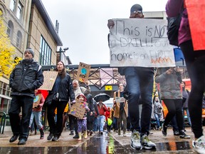 Protesters march in the global climate strike on Stephen Avenue in downtown Calgary on Friday, Sept. 27, 2019.