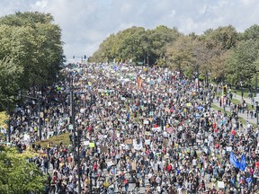 Thousands of people march in the global climate strike in Montreal on Friday, Sept. 27, 2019.
