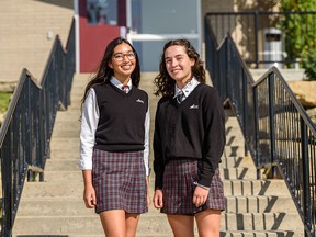 Kieran Anand and Alexia Chambers, Grade 12 students at Rundle College High School, are taking part in Friday's climate strike at city hall.