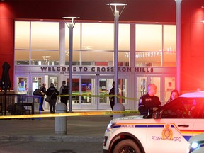 Police and RCMP lock down part of CrossIron Mills near SilverCity and the food court following a shooting that sent one person to hospital on Monday. Brendan Miller/Postmedia