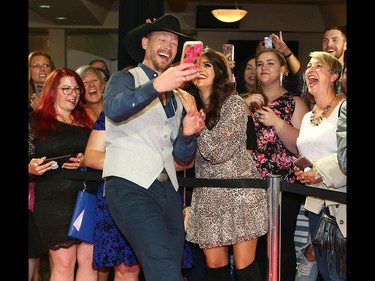 Paul Brandt has some fun with fans as he arrives on the red carpet at the Canadian Country Music Awards at the Saddledome in Calgary Sunday, September 8, 2019. Jim Wells/Postmedia